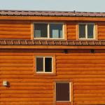 Log Exterior with Chocolate Brown Metal Roof