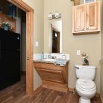 The Honeysuckle Model P-504 by Platinum Cottages and RRC Athens. This wheelchair friendly model features a roll-in shower w/ grab bars and a fold down seat. it also features wider doorways and other features making accessibility easier.